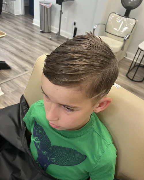 Fresh fade + custom design = one happy kid! 

Ready for summer with a clean cut and a little extra style. 😎✂️

stylist: Daneta Hudson